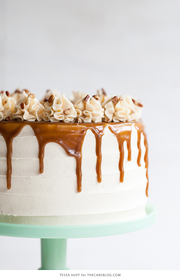 Apple Toffee Crunch Cake - fresh apple cake with crunchy pecans, cinnamon buttercream and a toffee sauce drip | by Tessa Huff for TheCakeBlog.com