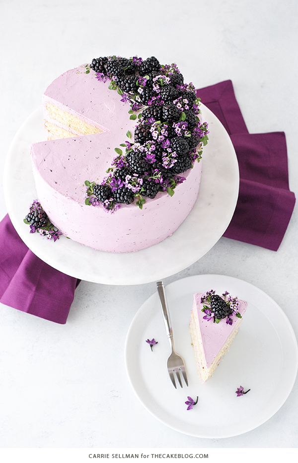 Blackberry Lime Cake - tender cake infused with lime zest, frosted with blackberry buttercream, topped with fresh blackberries and edible flowers | by Carrie Sellman for TheCakeBlog.com