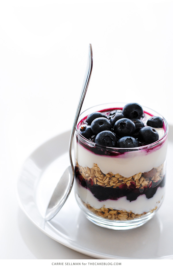 Roasted Blueberry Breakfast Parfaits with layers of roasted blueberries, granola and honey yogurt | by Carrie Sellman for TheCakeBlog.com