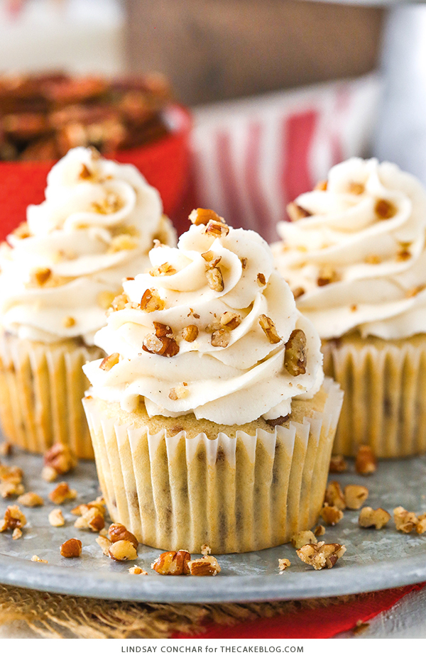 Butter Pecan Cupcakes - moist vanilla cupcakes studded with toasted butter pecans and topped with cinnamon buttercream frosting | by Lindsay Conchar for TheCakeBlog.com