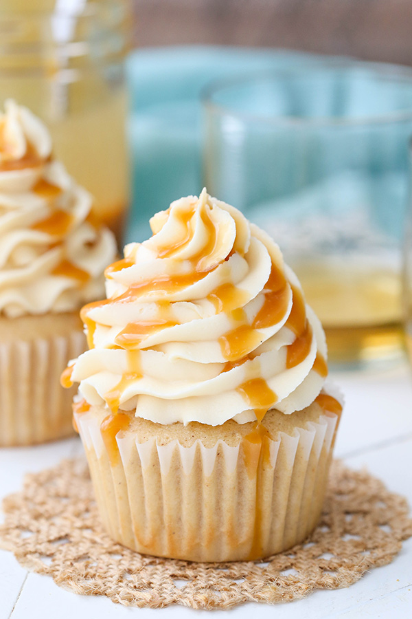 Caramel Bourbon Vanilla Cupcakes - a brown sugar bourbon cupcake topped with caramel vanilla frosting for a unique combination that is full of flavor!
