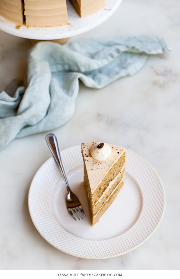 Caramel Cappuccino Cake - espresso cake paired with caramel buttercream frosting, topped with whole coffee beans and a sprinkle of cocoa powder | by Tessa Huff for TheCakeBlog.com