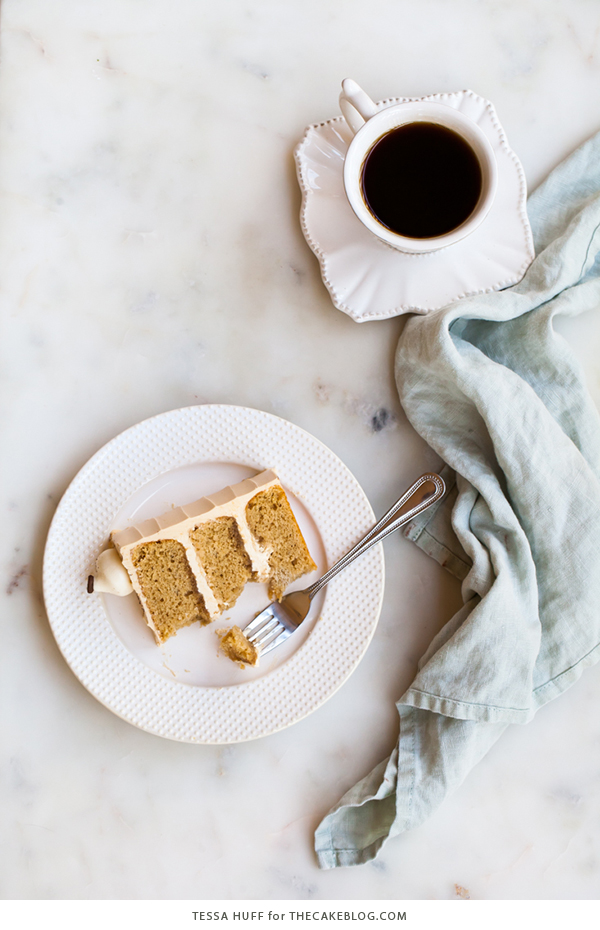 Caramel Cappuccino Cake - espresso cake paired with caramel buttercream frosting, topped with whole coffee beans and a sprinkle of cocoa powder | by Tessa Huff for TheCakeBlog.com