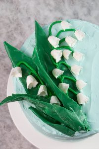 Chocolate Lilies - how to make Lily of the Valley cake decorations with chocolate | by Erin Gardner for TheCakeBlog.com