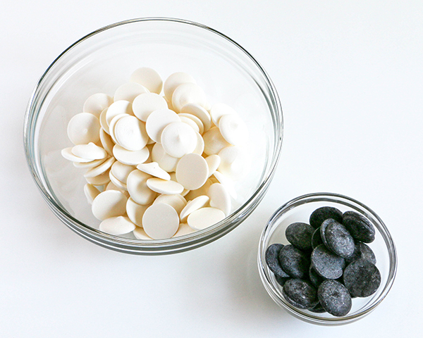 Marble Chocolate Hearts - how to make marbled heart toppers for cakes and cupcakes using chocolate coating and cookie cutters | by Erin Gardner for TheCakeBlog.com