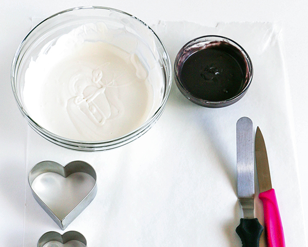 Marble Chocolate Hearts - how to make marbled heart toppers for cakes and cupcakes using chocolate coating and cookie cutters | by Erin Gardner for TheCakeBlog.com