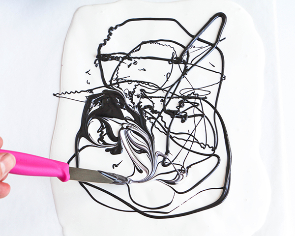 Marble Chocolate Hearts - how to make marbled heart toppers for cakes and cupcakes using chocolate coating and cookie cutters | by Erin Gardner for TheCakeBlog.com