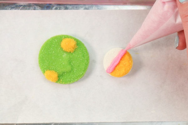 Sprinkle Ornament Cake – how to make sparkling ornaments for cakes and cupcakes using chocolate, cookie cutters and sprinkles | by Erin Gardner for TheCakeBlog.com