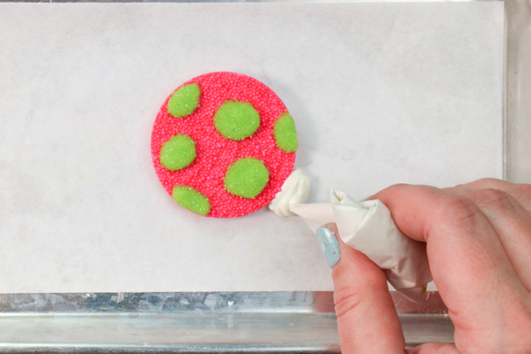 Sprinkle Ornament Cake – how to make sparkling ornaments for cakes and cupcakes using chocolate, cookie cutters and sprinkles | by Erin Gardner for TheCakeBlog.com