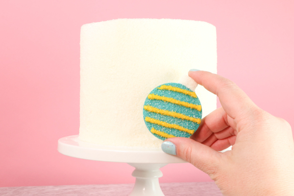 Sprinkle Ornament Cake – how to make sparkling ornaments for cakes and cupcakes using chocolate, cookie cutters and sprinkles | by Erin Gardner for TheCakeBlog.com