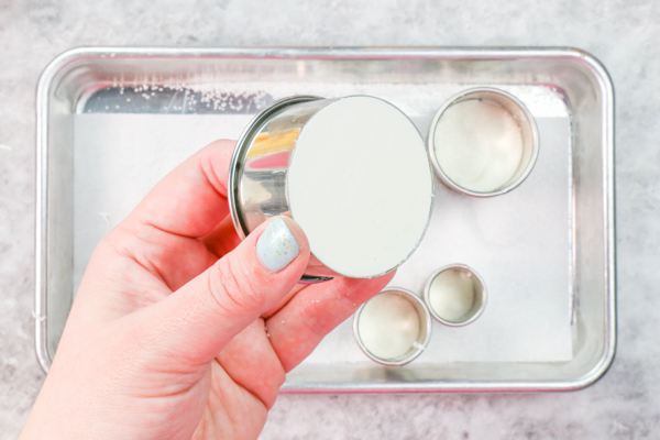 Sprinkle Ornament Cake – how to make sparkling ornaments for cakes and cupcakes using chocolate, cookie cutters and sprinkles | by Erin Gardner for TheCakeBlog.com