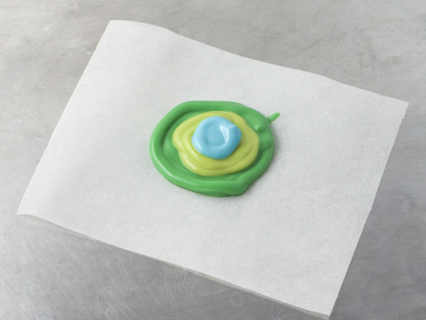 Mod Polka Dot Cake - how to make colorful polka dot toppers for cakes and cupcakes using chocolate coating | Erin Gardner for TheCakeBlog.com