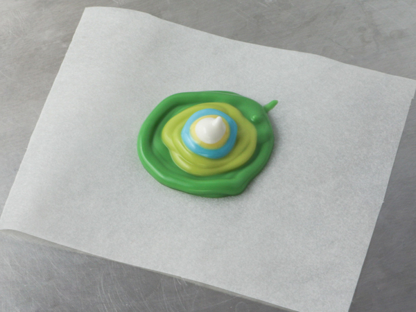 Mod Polka Dot Cake - how to make colorful polka dot toppers for cakes and cupcakes using chocolate coating | Erin Gardner for TheCakeBlog.com