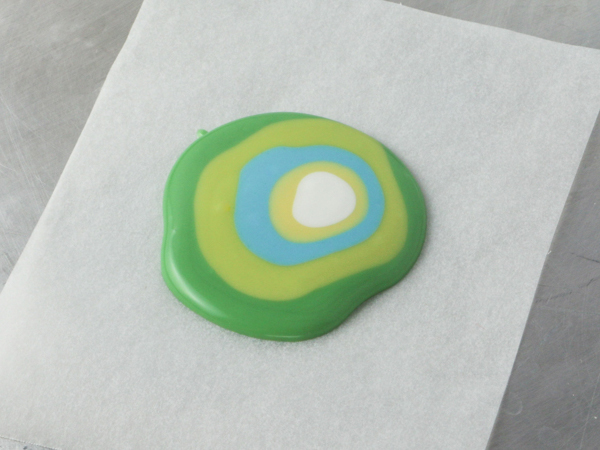 Mod Polka Dot Cake - how to make colorful polka dot toppers for cakes and cupcakes using chocolate coating | Erin Gardner for TheCakeBlog.com