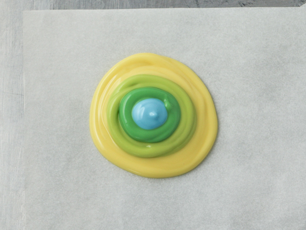 Mod Polka Dot Cake - how to make colorful polka dot toppers for cakes and cupcakes using chocolate coating | Erin Gardner for TheCakeBlog.com