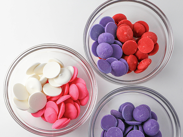 Mod Polka Dot Cake - how to make colorful polka dot toppers for cakes and cupcakes using chocolate coating | Erin Gardner for TheCakeBlog.com