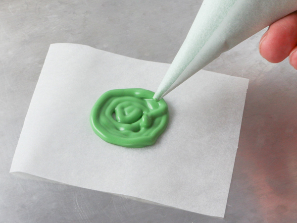 Mod Polka Dot Cake - how to make colorful polka dot toppers for cakes and cupcakes using chocolate coating | Erin Gardner for TheCakeBlog.com