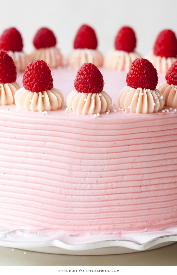 Chocolate Raspberry Cake - moist chocolate cake layered with raspberry jam, topped with raspberry cheesecake frosting and fresh red raspberries | by Tessa Huff for TheCakeBlog.com