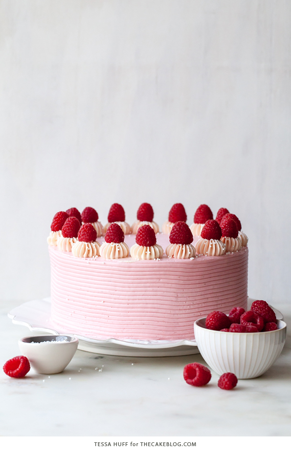 Chocolate Raspberry Cake - moist chocolate cake layered with raspberry jam, topped with raspberry cheesecake frosting and fresh red raspberries | by Tessa Huff for TheCakeBlog.com