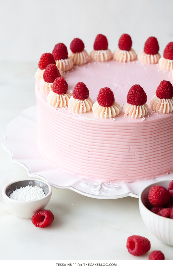 Chocolate Raspberry Cake - moist chocolate cake layered with raspberry jam, topped with raspberry cheesecake frosting and fresh red raspberries | by Tessa Huff for TheCakeBlog.com