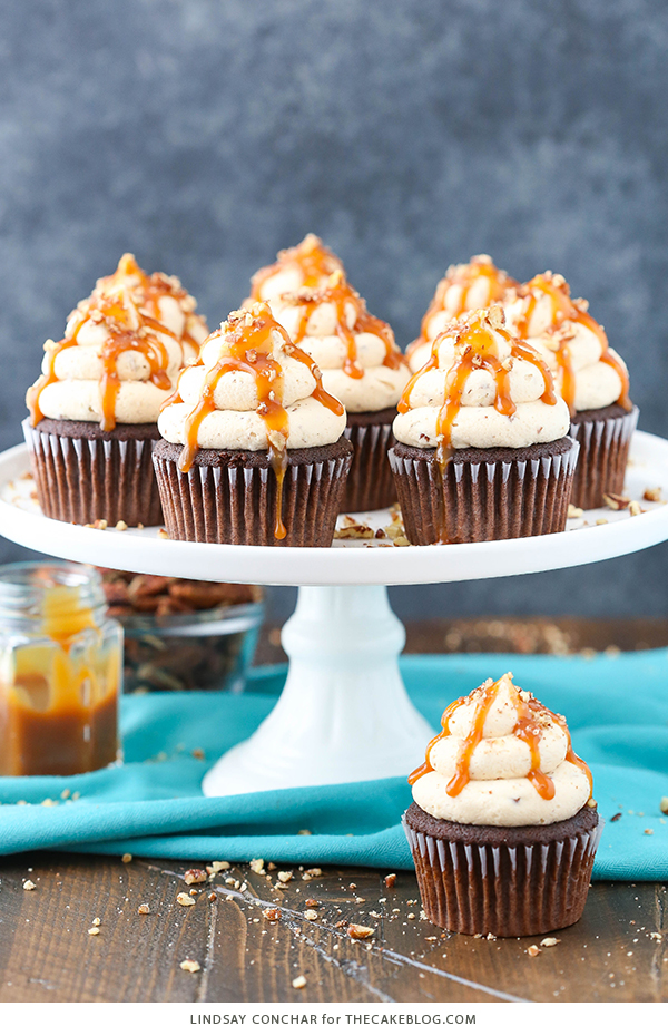 Chocolate Turtle Cupcakes - from scratch recipe for rich chocolate cupcakes with caramel pecan frosting, caramel drizzle and chopped pecans | by Lindsay Conchar for TheCakeBlog.com