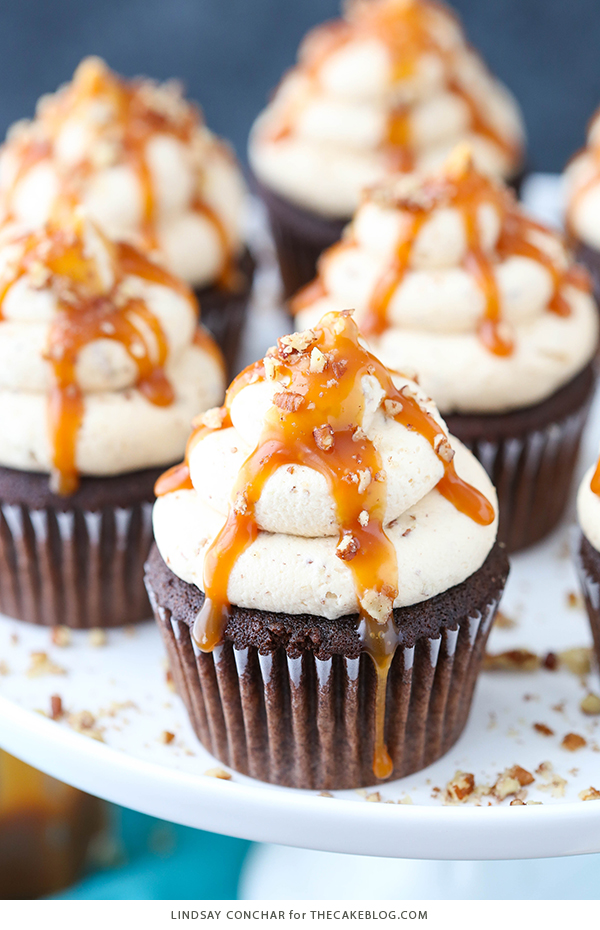Chocolate Turtle Cupcakes - from scratch recipe for rich chocolate cupcakes with caramel pecan frosting, caramel drizzle and chopped pecans | by Lindsay Conchar for TheCakeBlog.com