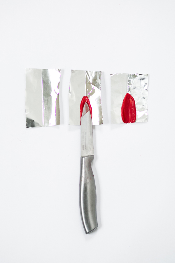 Chocolate Poinsettias - learn how to make these chocolate flowers with candy melts and a knife | Erin Gardner for TheCakeBlog.com