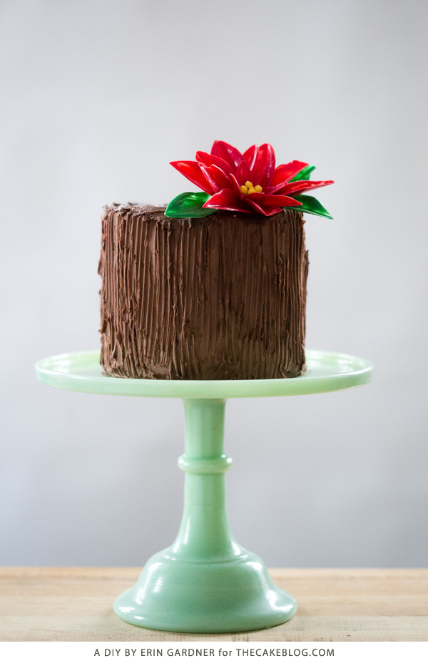 Chocolate Poinsettias - learn how to make these chocolate flowers with candy melts and a knife | Erin Gardner for TheCakeBlog.com