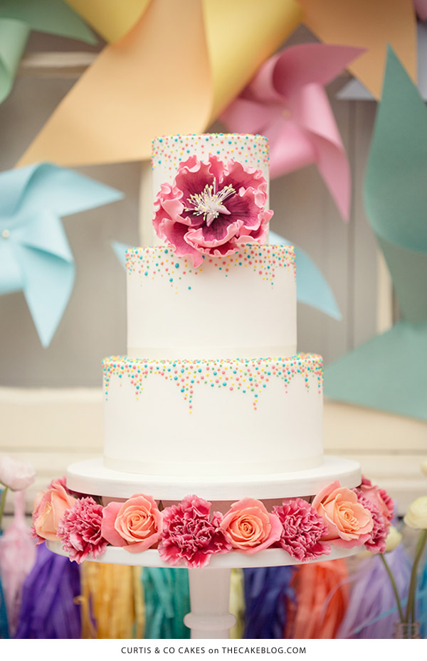 10 Confetti Throwing Cakes | including this design by Curtis & Co Cakes | on TheCakeBlog.com