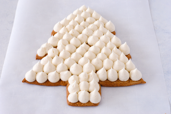 Cream Tart Tree Cake - gingerbread cookie with cream cheese frosting and festive holiday toppings | by Carrie Sellman for TheCakeBlog.com