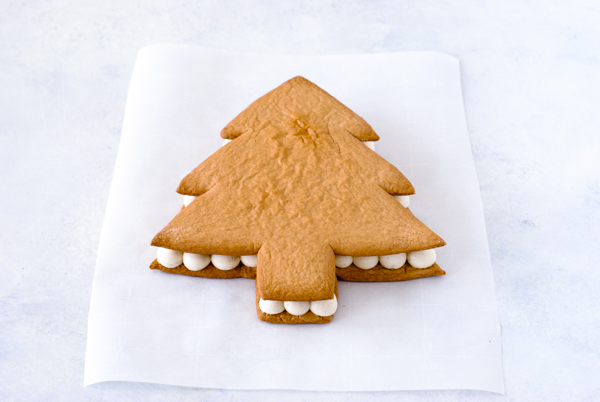 Cream Tart Tree Cake - gingerbread cookie with cream cheese frosting and festive holiday toppings | by Carrie Sellman for TheCakeBlog.com