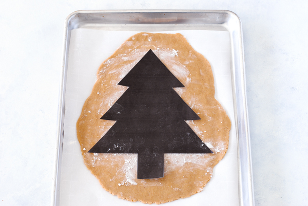 Cream Tart Tree Cake - gingerbread cookie with cream cheese frosting and festive holiday toppings | by Carrie Sellman for TheCakeBlog.com