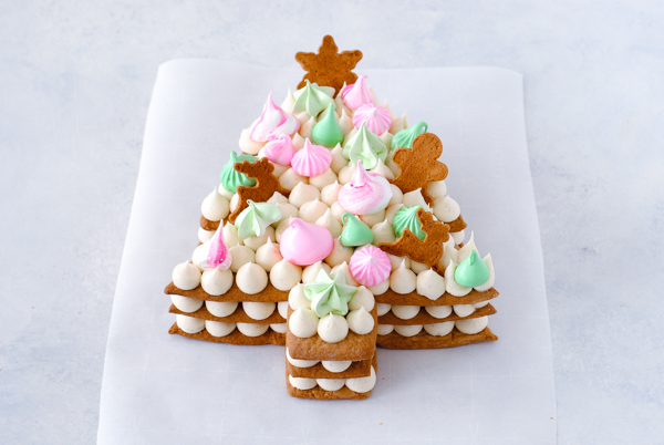 Cream Tart Tree Cake - gingerbread cookie with cream cheese frosting and festive holiday toppings | by Carrie Sellman for TheCakeBlog.com