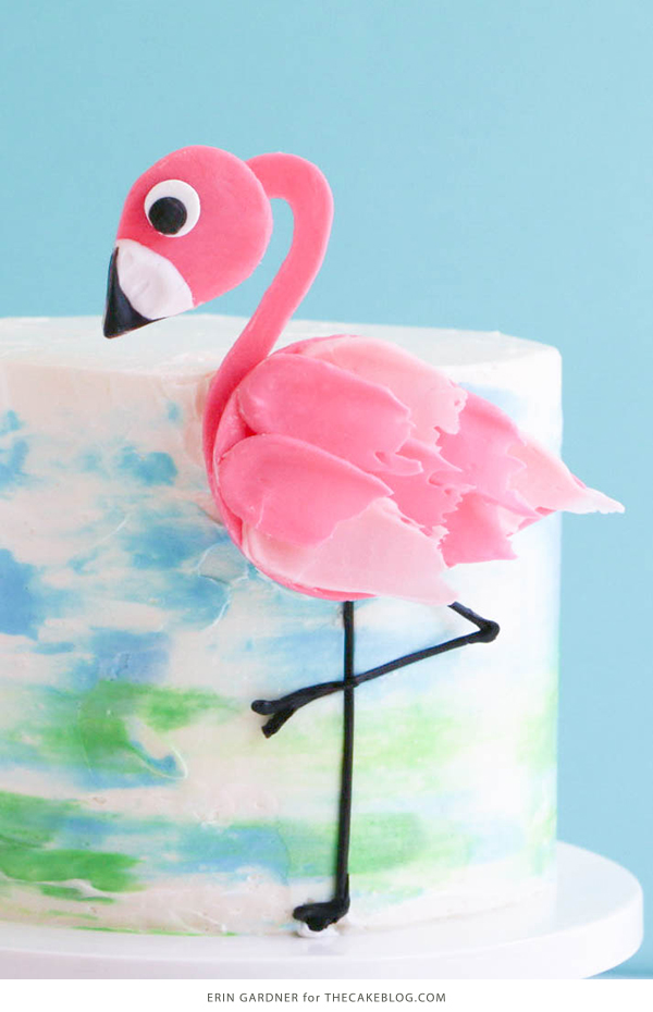 Flamingo Cake - how to make a pink flamingo cake topper using chocolate candy melts and brushstroke feathers | by Erin Gardner for TheCakeBlog.com