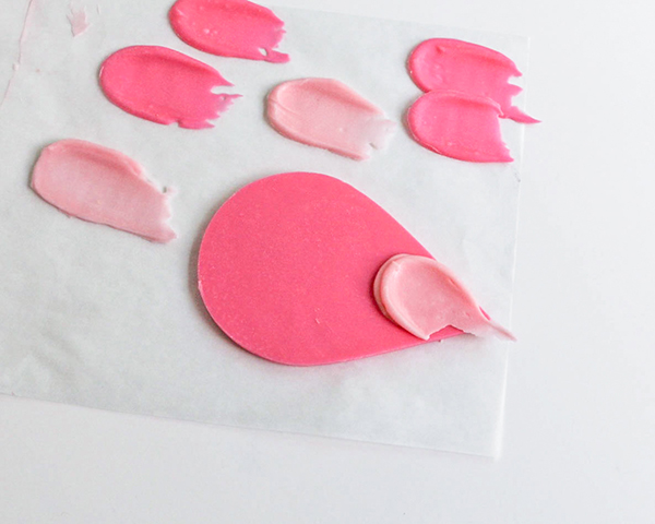 Flamingo Cake - how to make a pink flamingo cake topper using chocolate candy melts and brushstroke feathers | by Erin Gardner for TheCakeBlog.com