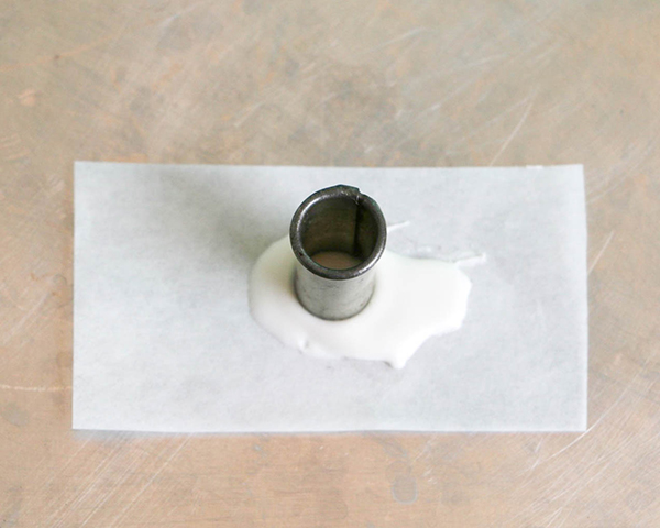 Flamingo Cake - how to make a pink flamingo cake topper using chocolate candy melts and brushstroke feathers | by Erin Gardner for TheCakeBlog.com