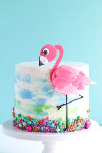 Flamingo Cake - how to make a pink flamingo cake topper using chocolate candy melts and brushstroke feathers | by Erin Gardner for TheCakeBlog.com