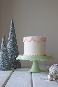 Six layers of gingerbread cake and espresso buttercream with toffee bits | Gingerbread Latte Cake | by Tessa Huff for TheCakeBlog.com