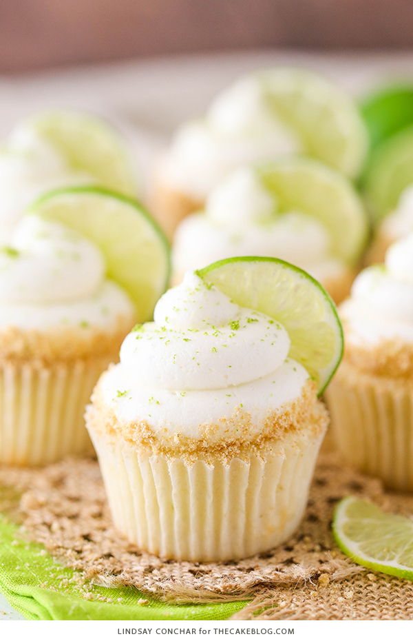 Key Lime Cupcakes - light, fluffy cupcakes full of key lime flavor! With lime juice and zest, topped with a tangy sweet lime frosting and graham cracker crumbs | by Lindsay Conchar for TheCakeBlog.com