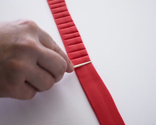 Winter Hat Cake - learn how to make this cozy cake that looks just like a knitted hat | by Cakegirls for TheCakeBlog.com