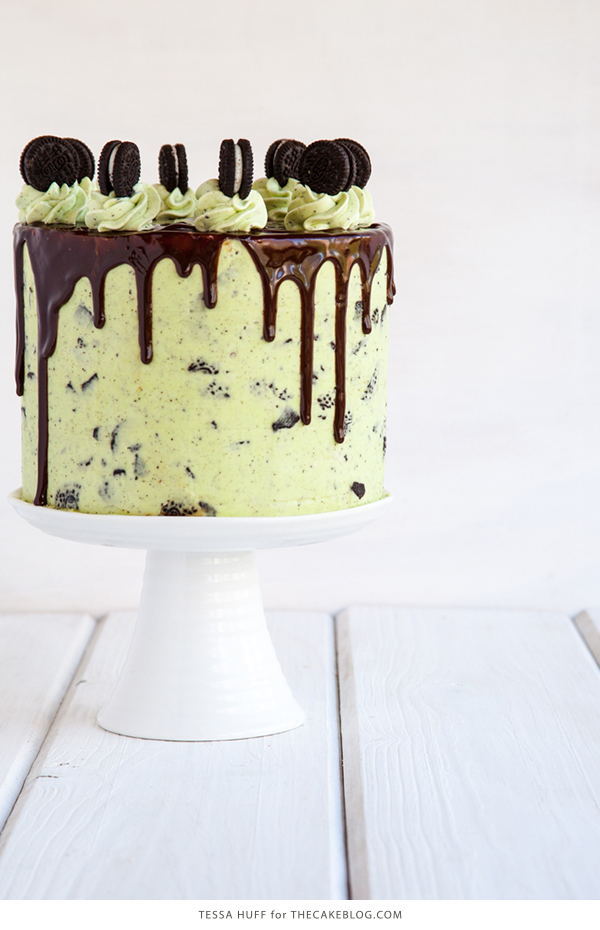 Mint Cookies 'N Cream Cake with crushed cookies in the cake and frosting plus a chocolate drip | by Tessa Huff for TheCakeBlog.com