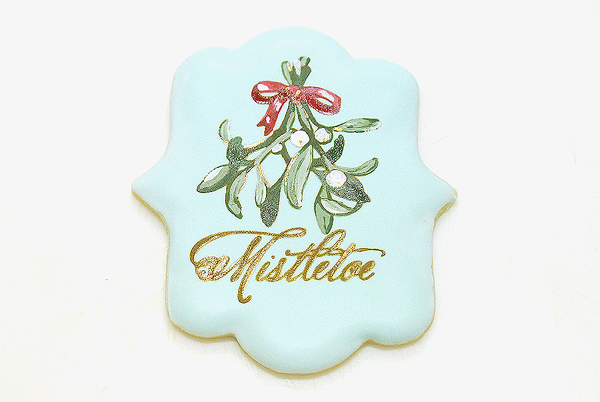 How to stencil-paint a cookie | Mistletoe Cookie Tutorial | by Robin Martin for TheCakeBlog.com