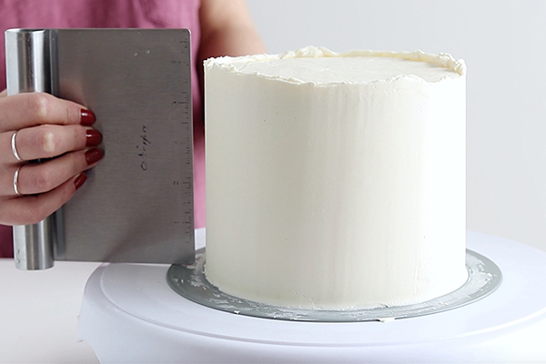 Pastel Rainbow M&M Cake | by Whitney DePaoli for TheCakeBlog.com