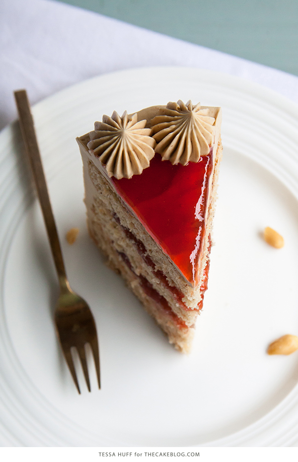 Peanut Butter & Jelly Cake | peanut butter cake with brown sugar peanut butter frosting, strawberry jam and chopped peanuts | by Tessa Huff for TheCakeBlog.com