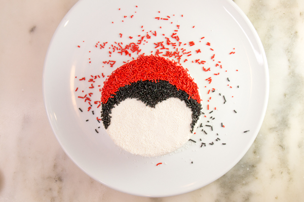 Penguin Cake - a sprinkle coated penguin cake too adorable for words | by Erin Gardner for TheCakeBlog.com