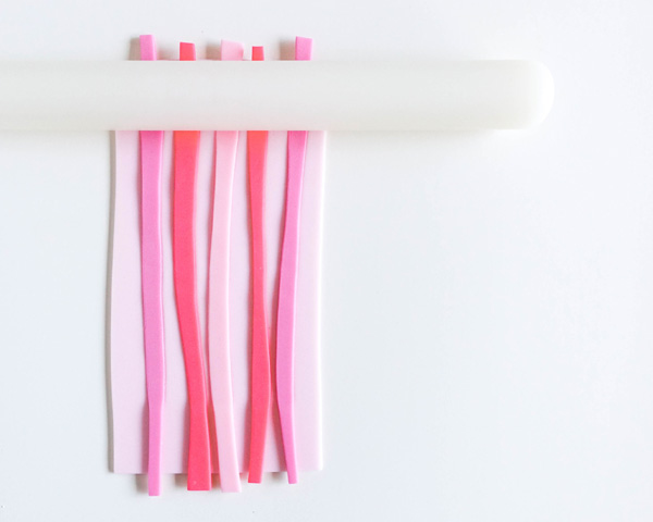 How to make striped heart toppers for cake and cupcakes | Tutorial by AK Cake Design for TheCakeBlog.com