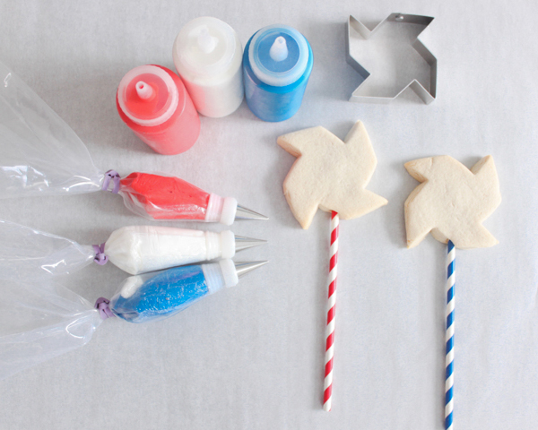 Pinwheel Cookies -- red, white and blue pinwheel cookies on a stick | by ellenJAY for TheCakeBlog.com