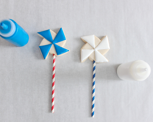 Pinwheel Cookies -- red, white and blue pinwheel cookies on a stick | by ellenJAY for TheCakeBlog.com