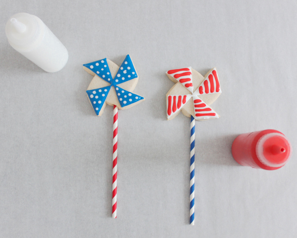 Pinwheel Cookies -- red, white and blue pinwheel cookies on a stick | by ellenJAY for TheCakeBlog.com