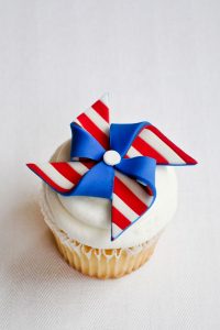 DIY Patriotic Pinwheel Cupcakes in Red, White & Blue | by Carrie Sellman for TheCakeBlog.com